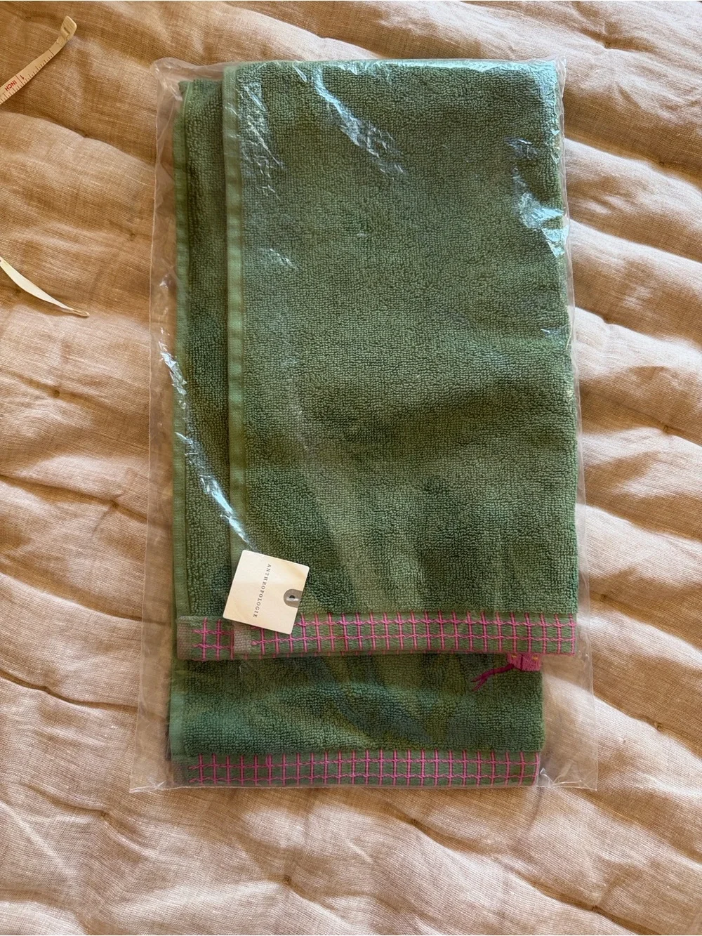 Anthropologie Green Embroidered Hand Towel with Pink Accent